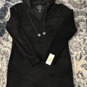 It is a dress. It is v neck and long sleeves.